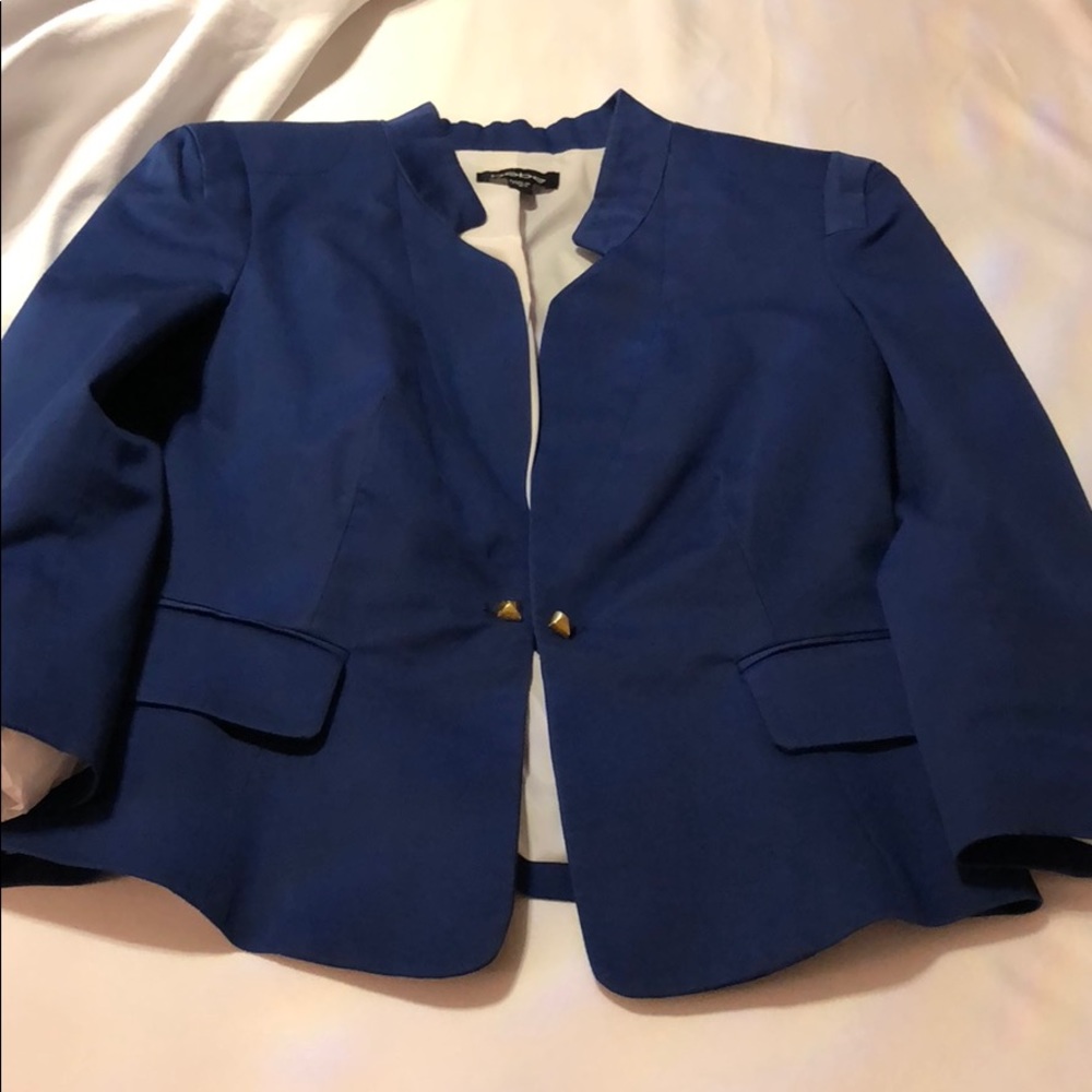 Dark blue Bebe blazer. Fitted on the waist.